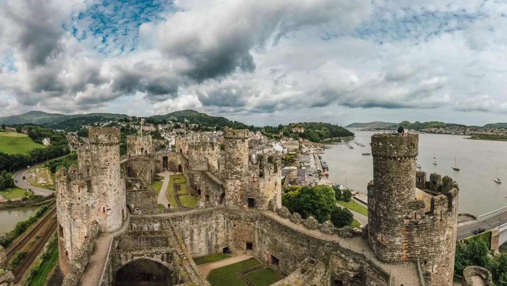 View from the top of one of the towers looking out over Conwy Castle towards the town and estuary beyond