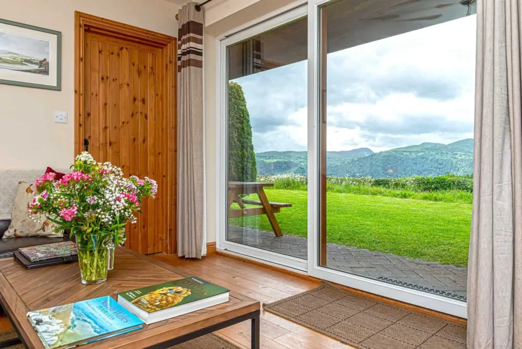 Conwy Valley Getaway | LAUREL COTTAGE LIVING AREA LOUNGE WITH VIEW 1 Conwy Valley Getaway | LAUREL COTTAGE LIVING AREA LOUNGE WITH VIEW 1