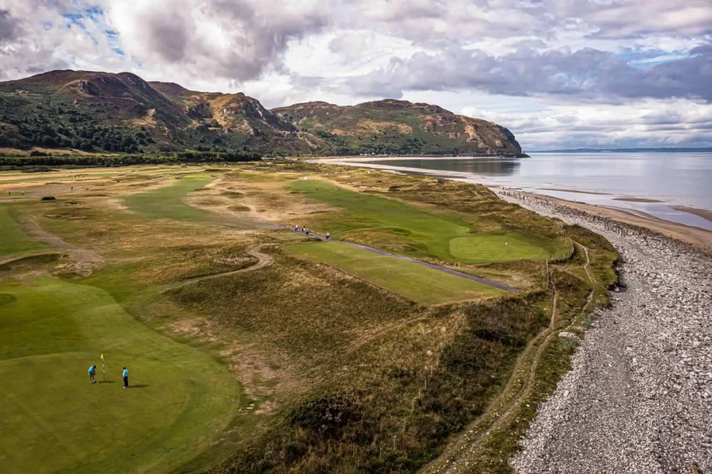 Conwy Valley Getaway | 175448 conwy golf club web optimised 1920px Wide view of the stunning location of Conwy Golf Club with the sea on the right and mountains in the background