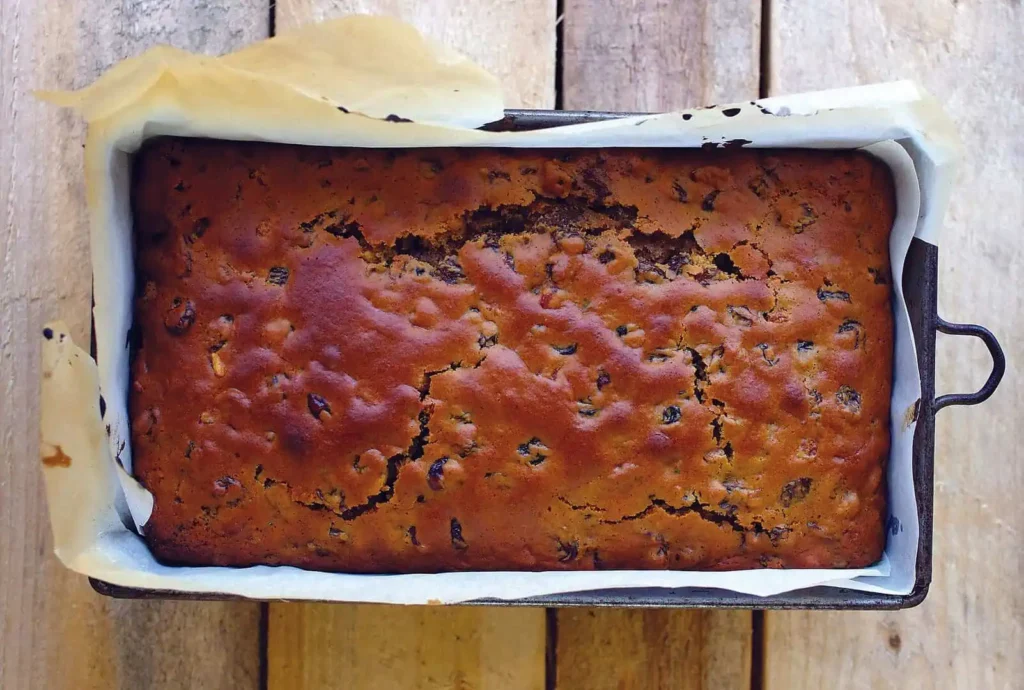 Detail shot of a traditional bara brith still in its tin fresh from the oven