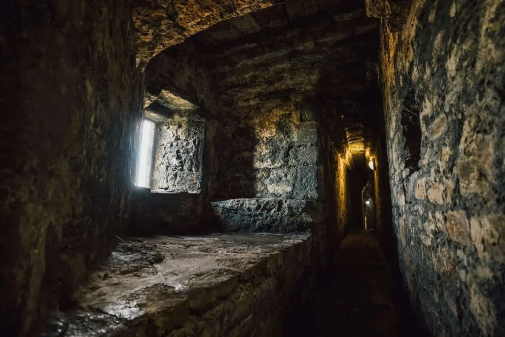Conwy Valley Getaway | 732354 beaumariscastle 213 web optimised 1920px Interior of Beaumaris Castle with narrow passage and thick stone walls