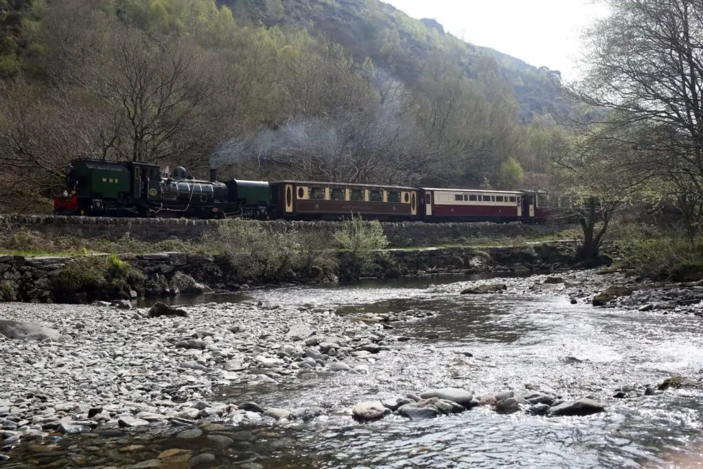 Welsh Highland Railway steam train makes it’s way through the tree-lined Aberglaslyn Pass