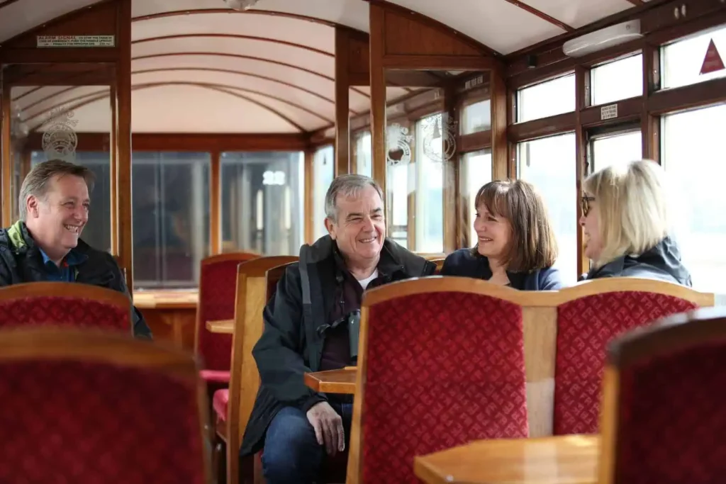 Conwy Valley Getaway | 21431 ffestiniog railway snowdonia web optimised 1920px Ffestiniog Railway passengers sitting in the carriage