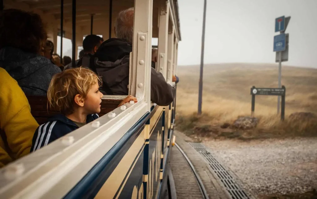Conwy Valley Getaway | 50691 wcp mg 9423 web optimised 1920px Little boy looking out of the window of the Great Orme Tramway