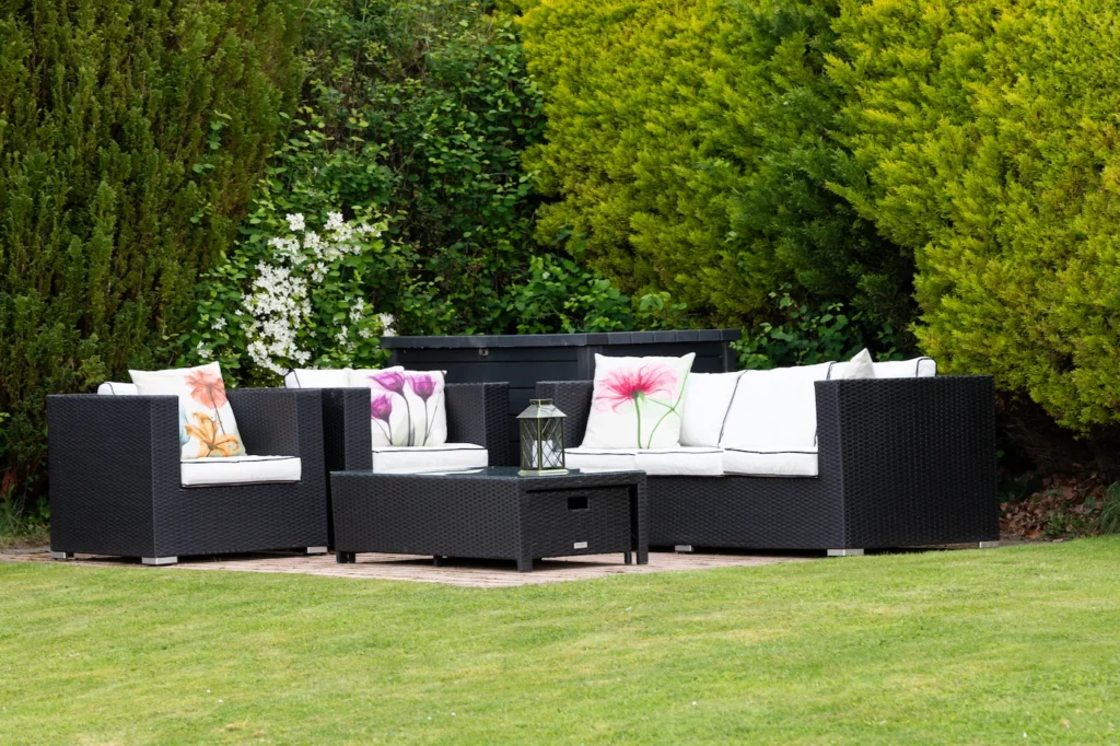 Fig Tree cottage patio seating area with colourful cushions