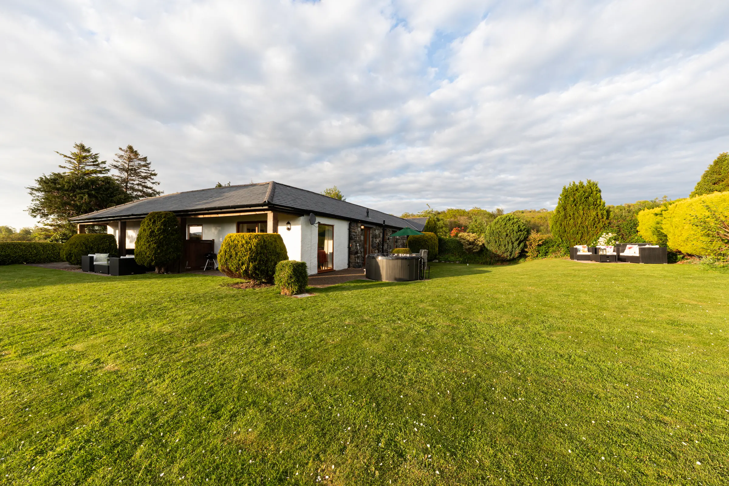 Exterior view of Fig Tree and Laurel holiday cottages taken in early evening