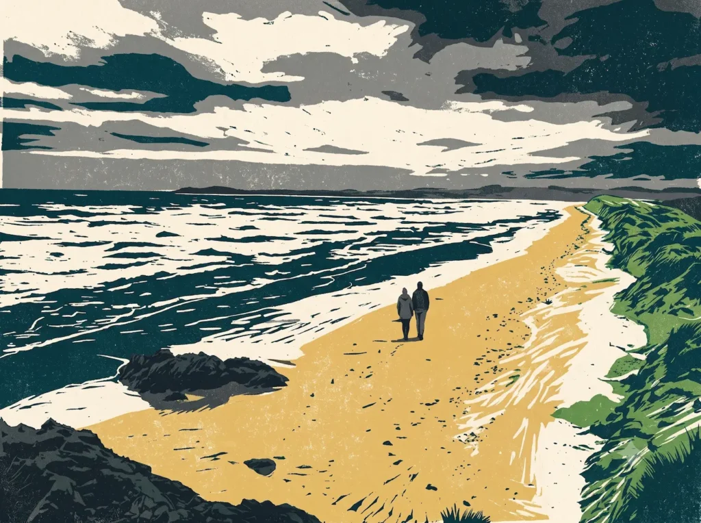 Couple walking on Llanddwyn Beach in North Wales